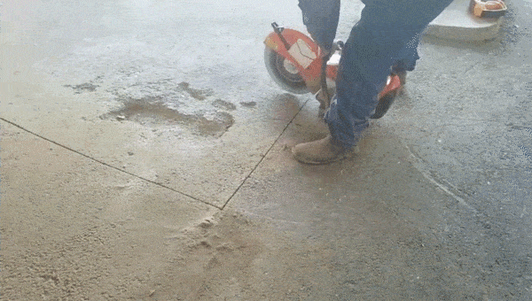Handheld asphalt saw