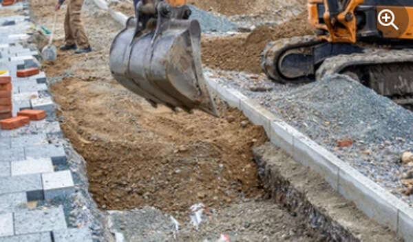how to backfill a trench with an excavator