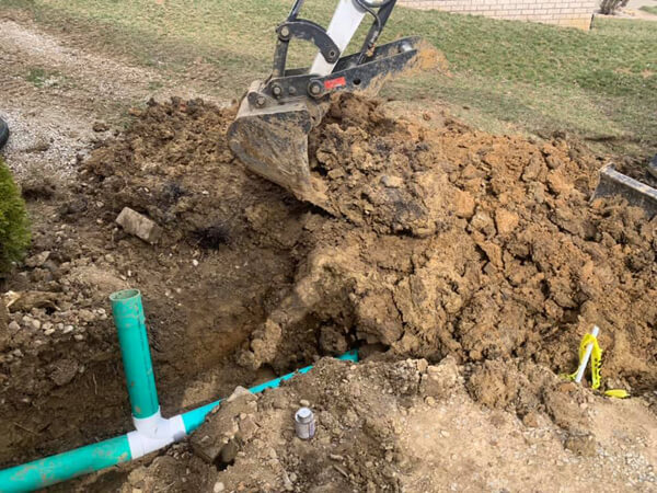 how to backfill drainage pipe