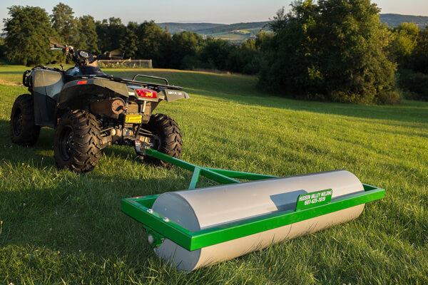 Lawn roller to compact soil deals